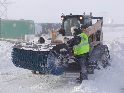 brushing snow